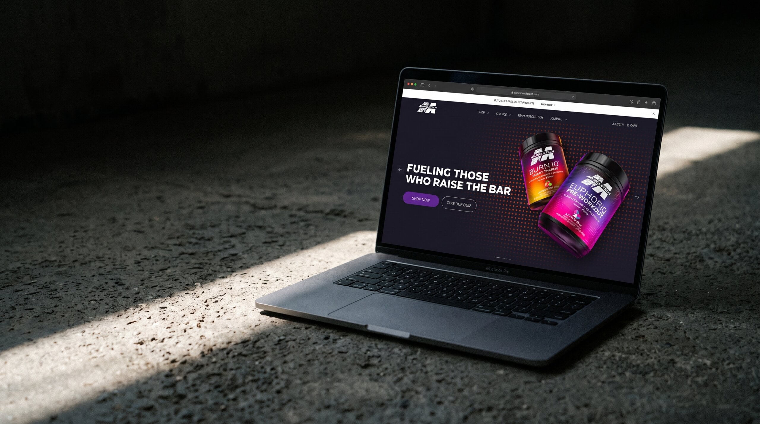 MacBook_on_concrete_floor_2K_202608112043-1